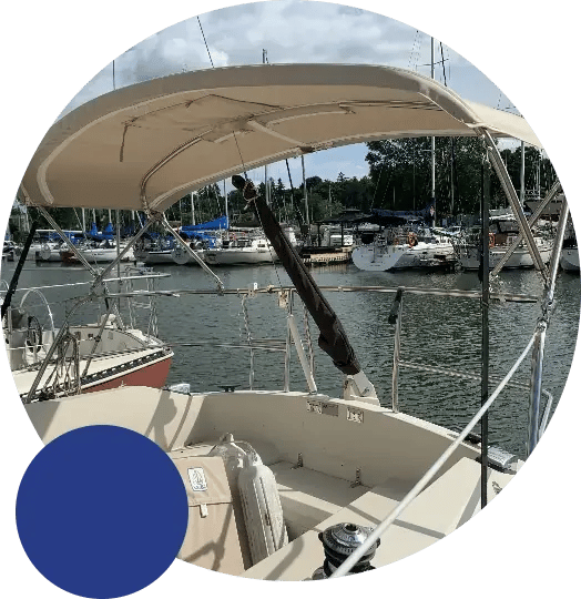 view of boats from a boat in marina